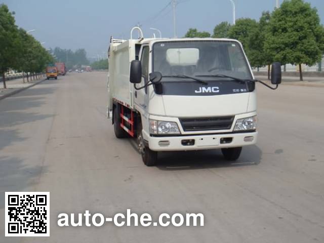 Мусоровоз с уплотнением отходов Jiangte JDF5060ZYSJ4